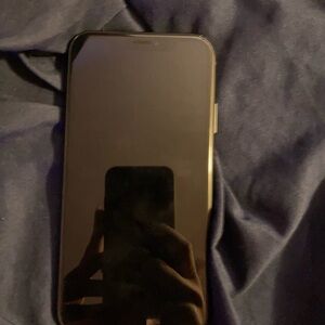 Sleek Black Cell Phone with Reflective Screen